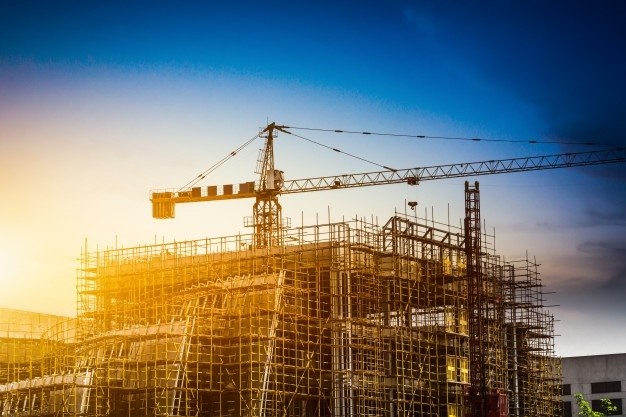 construction silhouette of a metal building